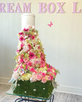 4.5 feet tall floral arrangement. Floral Fountain flowing down from a box. Pink floating arrangement. 