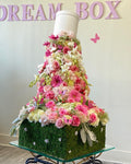 4.5 feet tall floral arrangement. Floral Fountain flowing down from a box. Pink floating arrangement. 