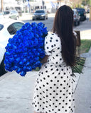 Our Blue Rose Bouquet is a hand-crafted bouquet with a simple ribbon around it and Royal Blue long stem roses.   The one in the picture has approximately 125 roses. 