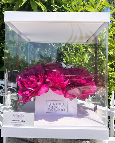 White Amelia Box with hot pink peonies inside, decorated with a butterfly